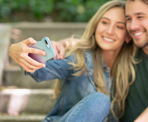 Harmony case on iPhone 12 with couple taking selfie