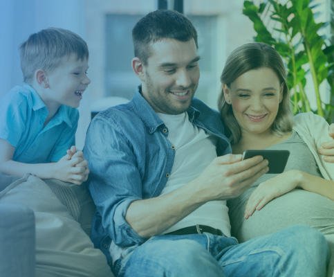 Dad and family watching a video on his phone