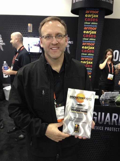 CEO Kirk Feller showing off Pure and CES Innovation Award.